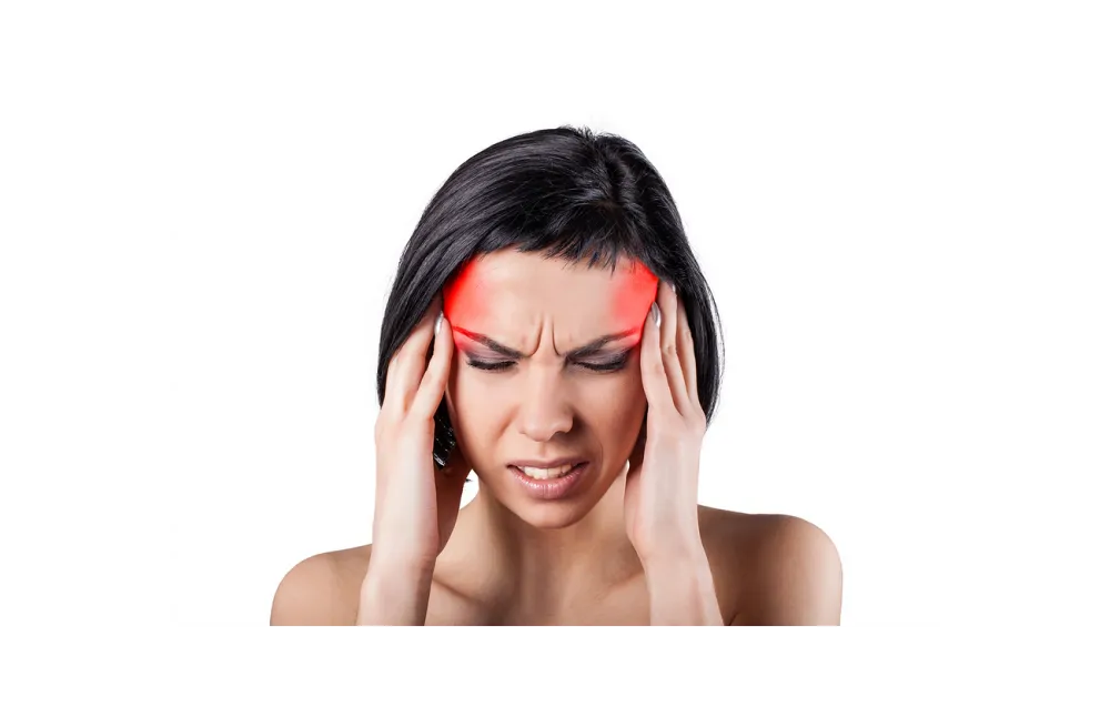 woman with headache or migraine before seeing a chiropractor in Clayton