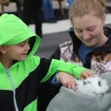 children with a rabbit