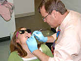Dr. Dickerson with a patient