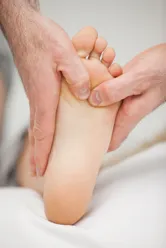 Foot Doctor Checking Foot 
