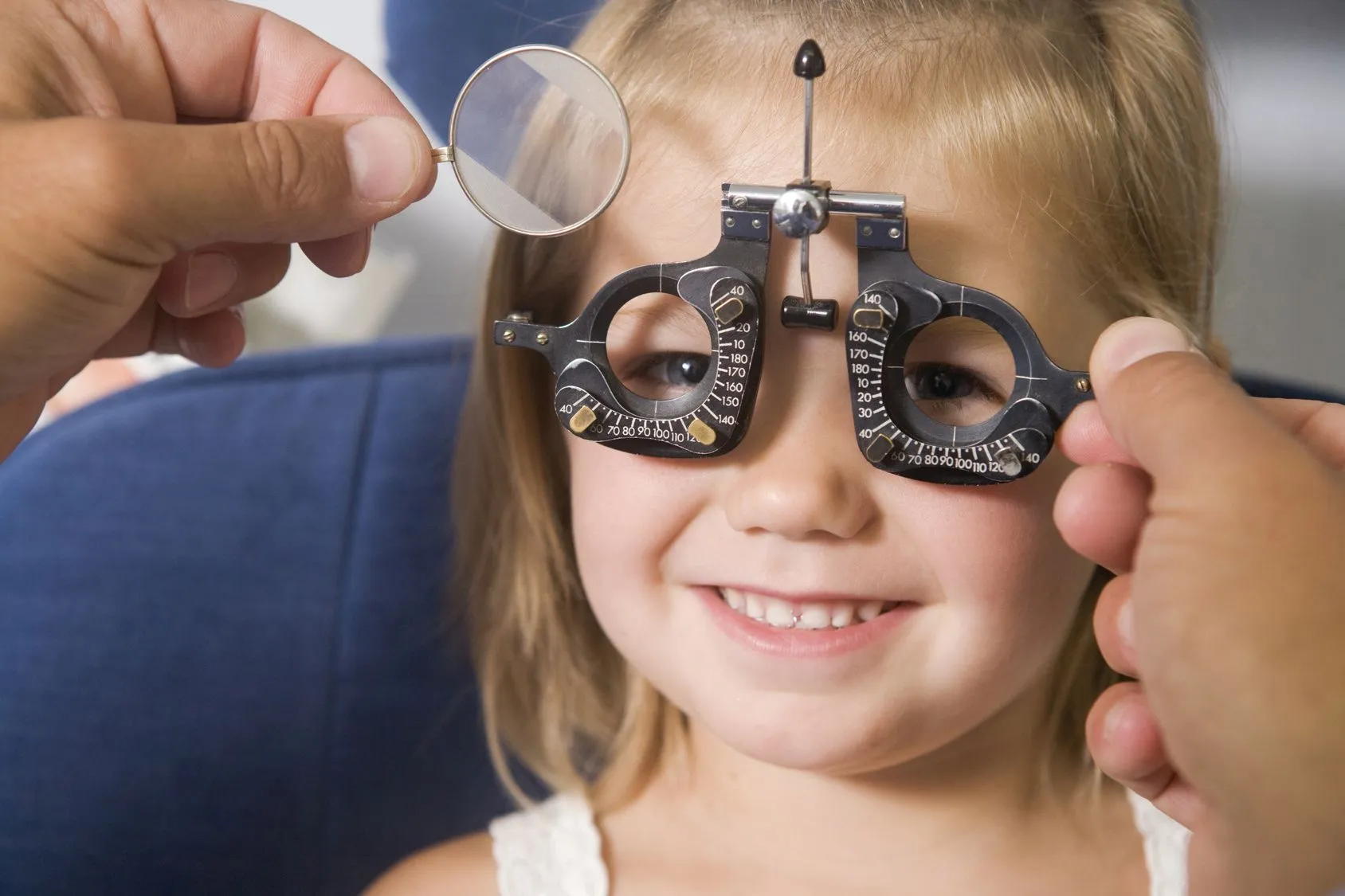 little girl getting her eyes checked