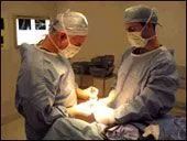 Doctors Working On Patient