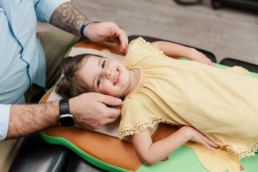 If you see this text, you are missing this little girl’s sweet face while getting her adjustment. Check back soon, and maybe it will upload properly for ya!