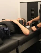 spinal decompression NYC Located in downtown manhattan utilizing the DRX 9000 non-surgical spinal decompression suite to treat herniated disc back pain sciatica and neck pain