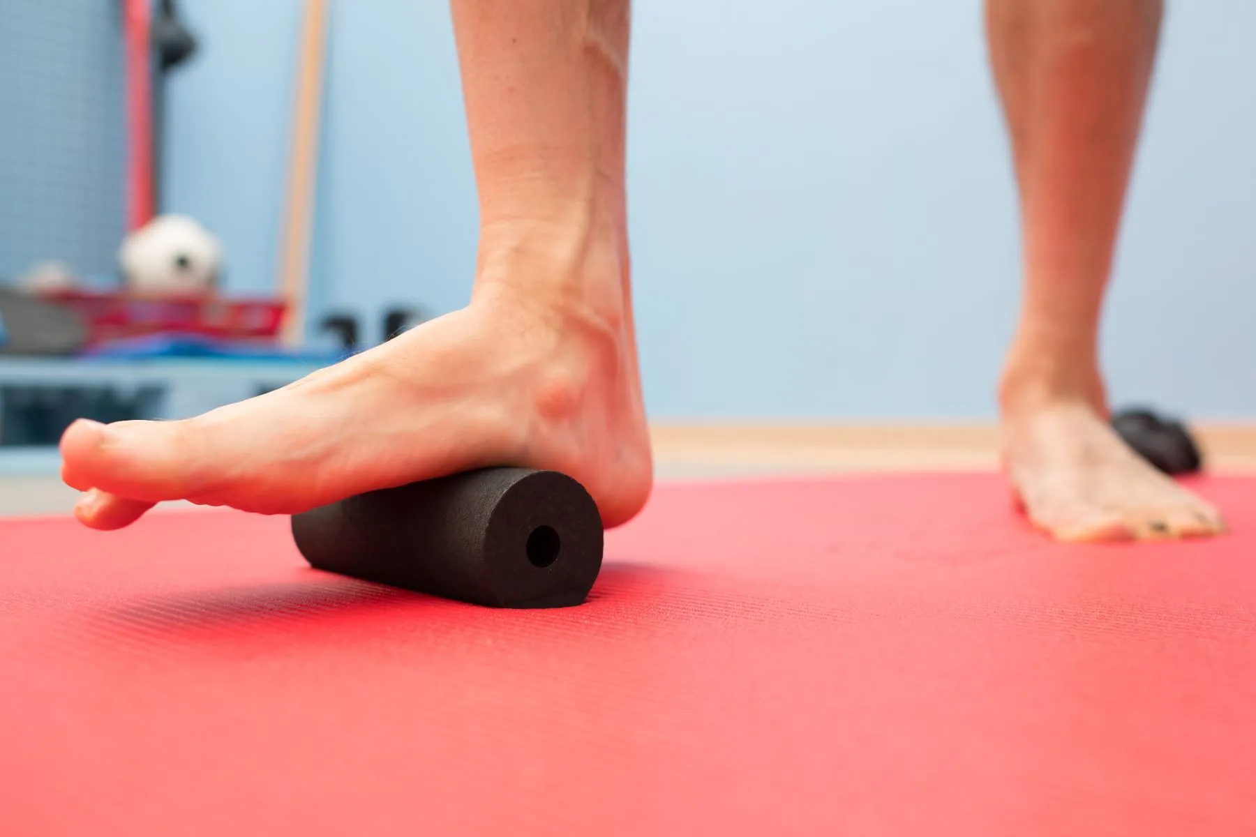 patient massaging their foot 