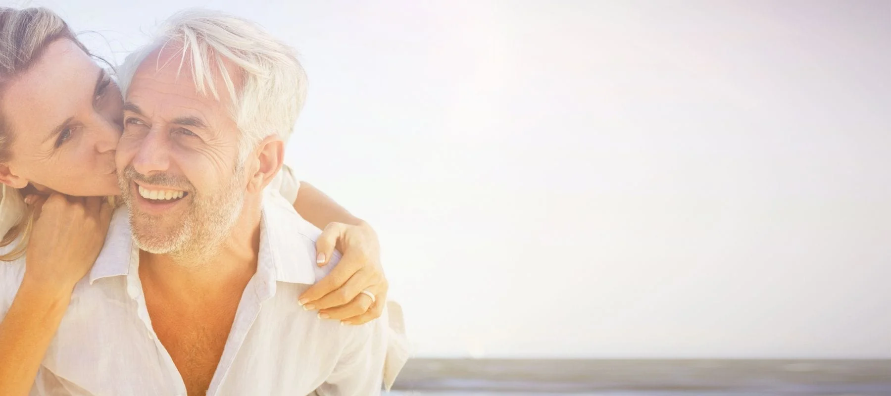 Elderly Couple Hugging