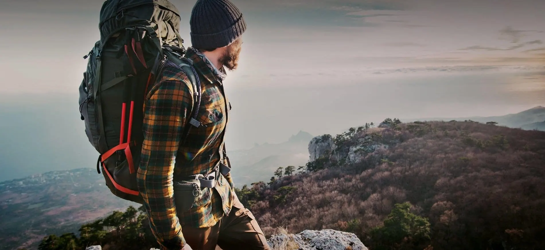 man standing on the mountain