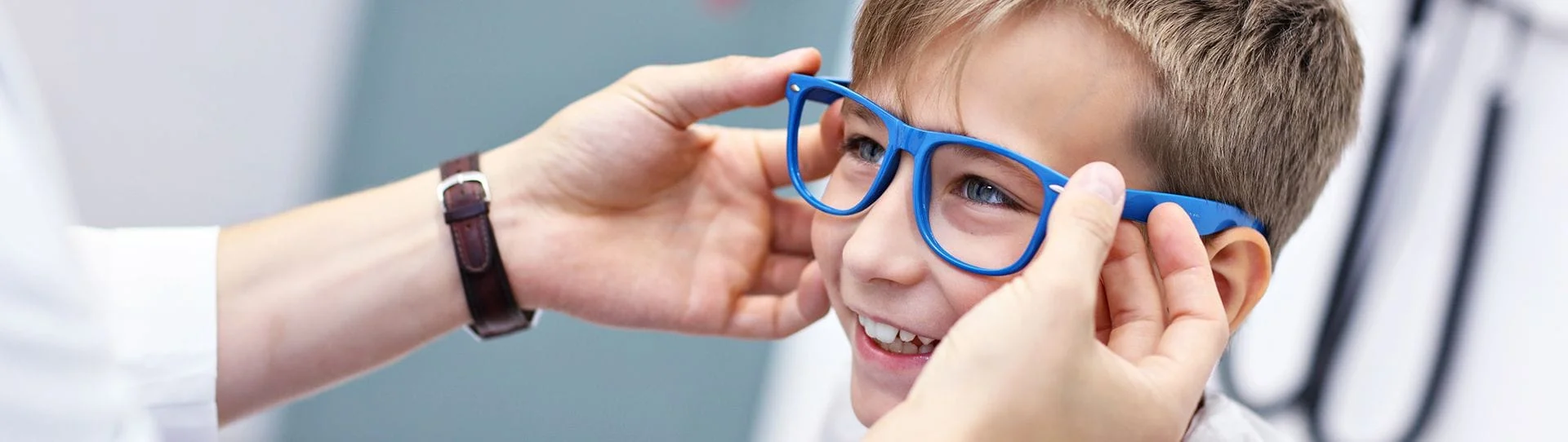 young boy with glasses