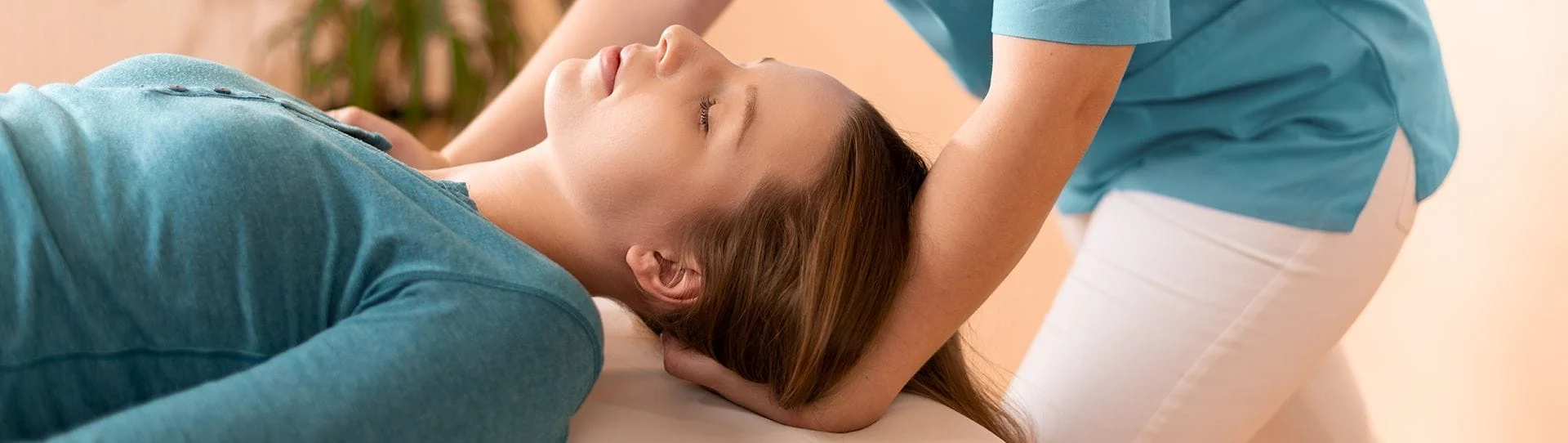women getting spinal adjustment