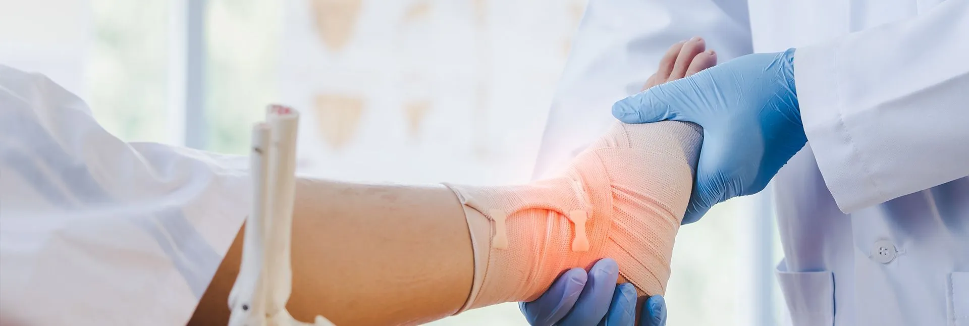 doctor examining a broken leg