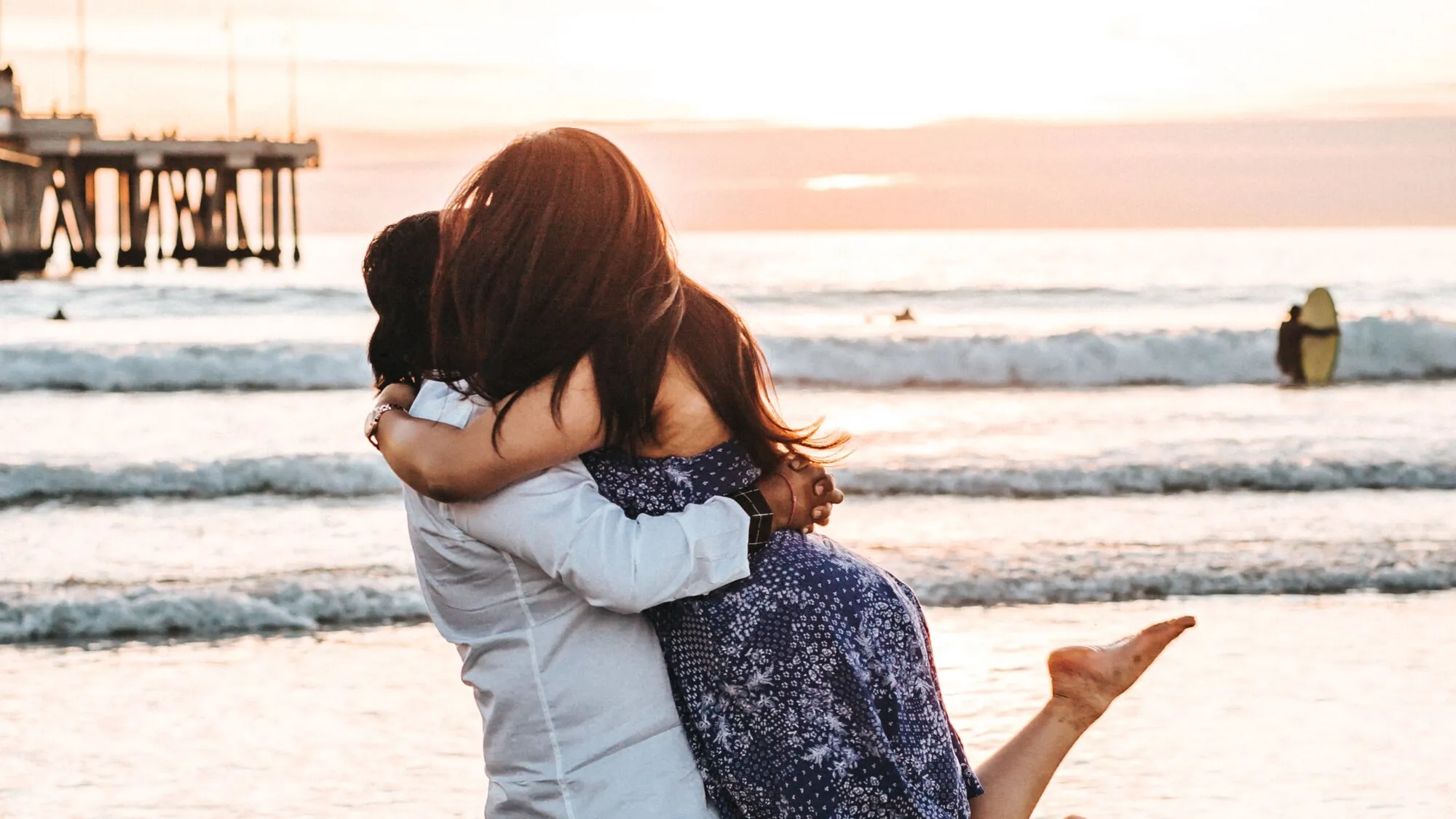 couple embracing on the beach