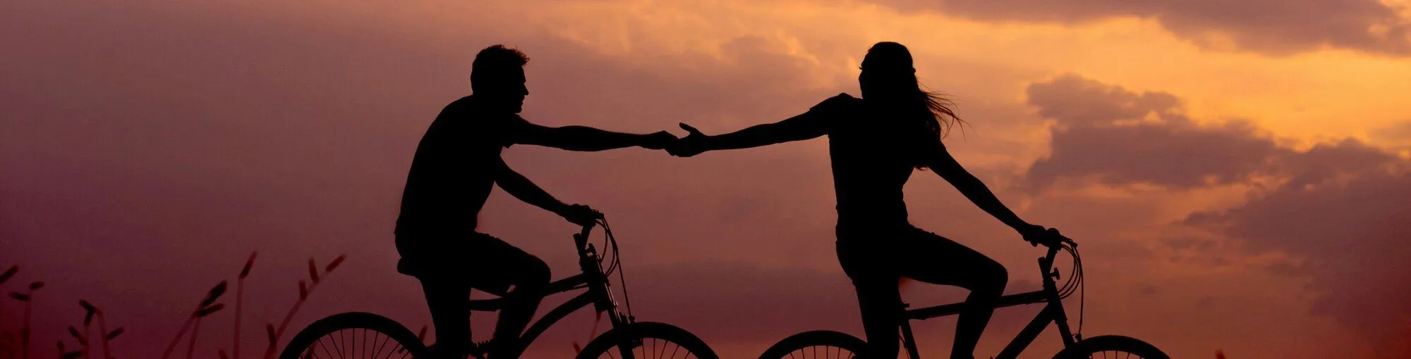 couple biking