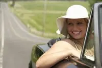 Woman smilling in car