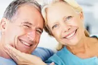 elderly couple smiling