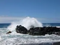 Waves hitting rock