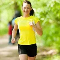 Woman running and smiling