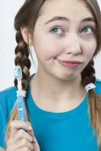 toothbrush_girl_funny_expression.jpg