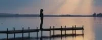 Woman standing on Dock