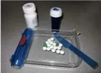 an image of a pill bottle from the manufacturer, A pill counting tray, and a blue perscription bottole