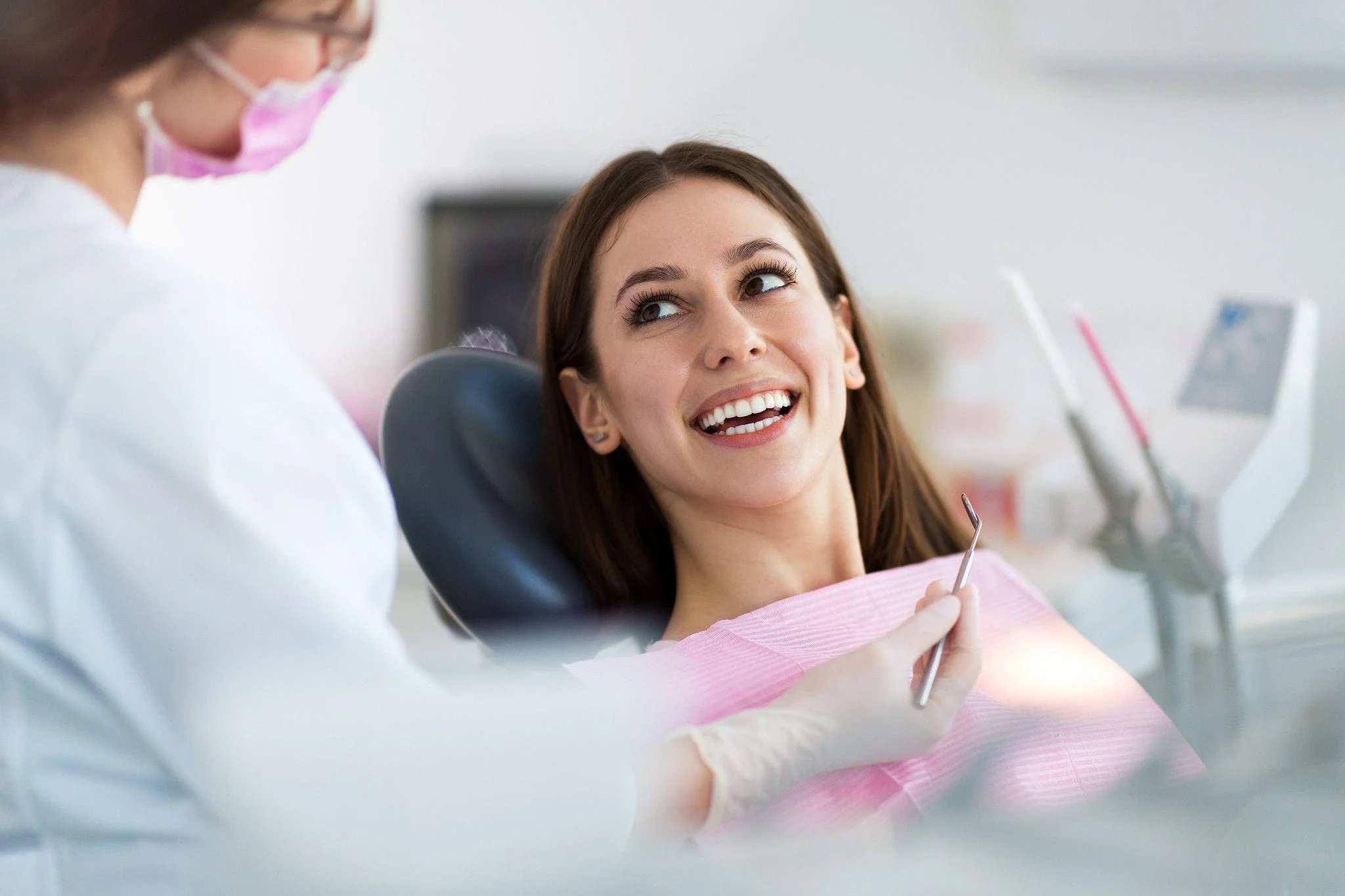 Dentist showing patient xray