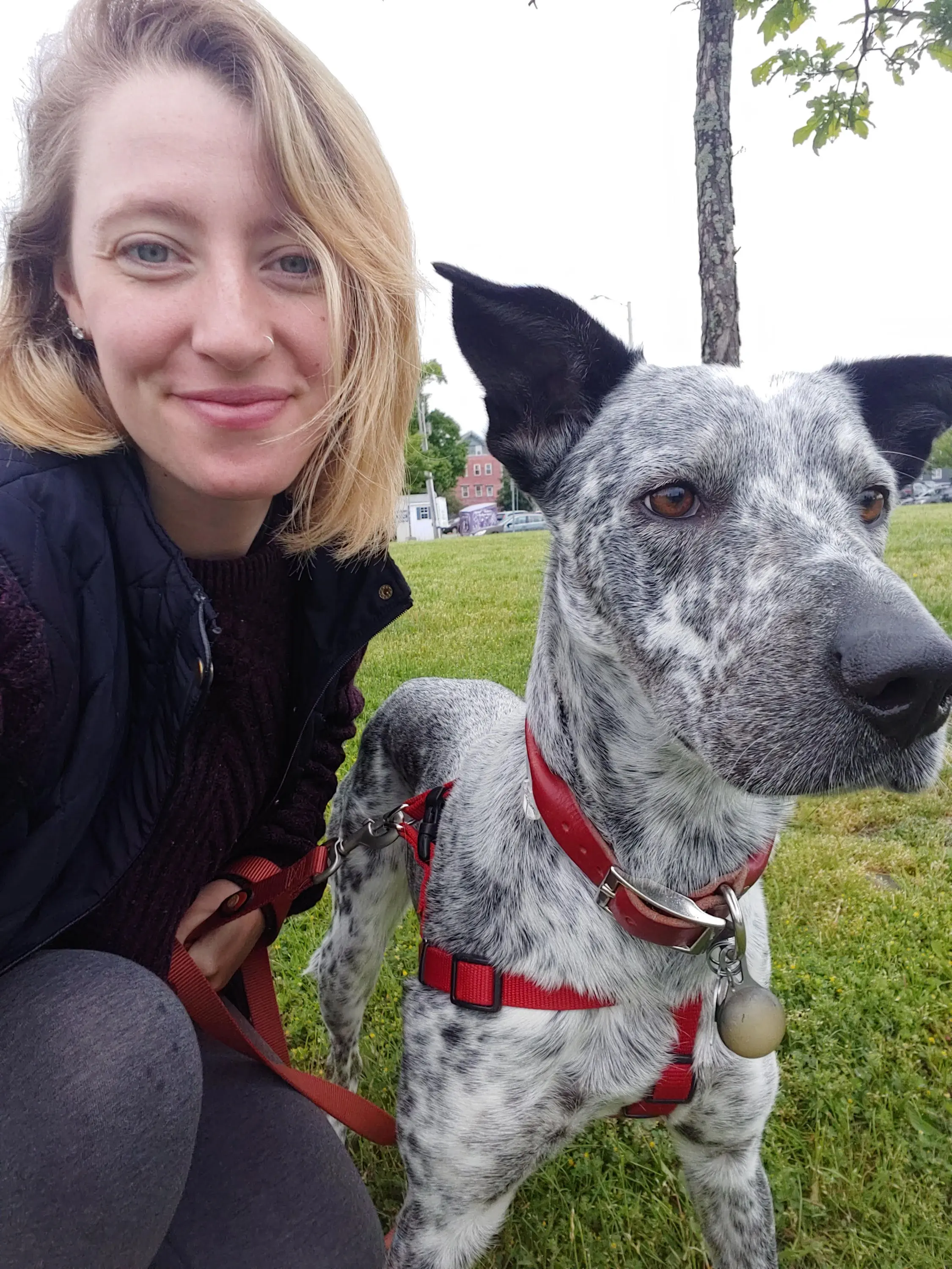 Erin with dog smiling