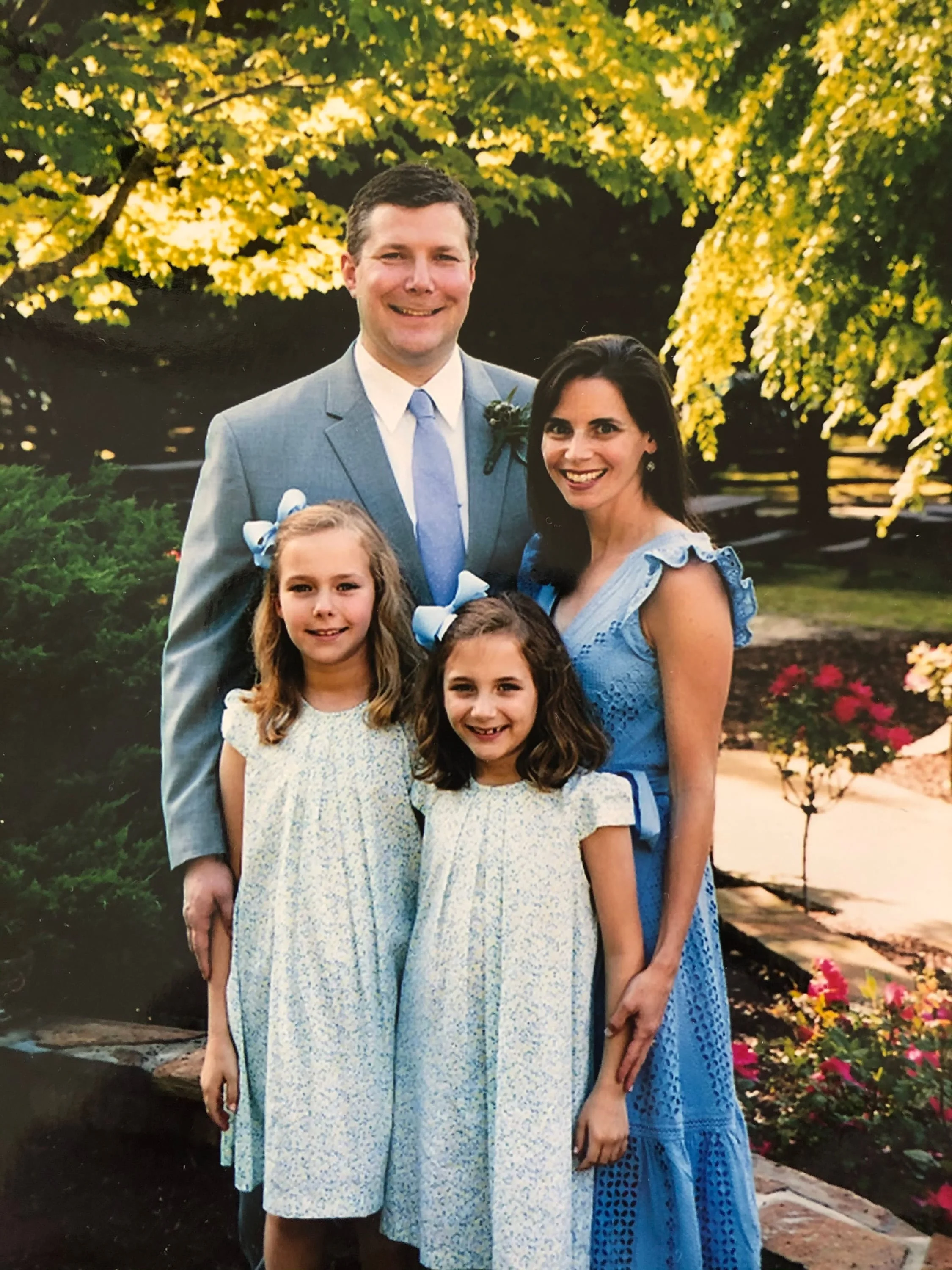 Dr. Hancock, his wife Courtney and their twin girls Ellaree and Hadley (10).