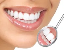 dental mirror reflecting mouth with really white teeth, Fountain Valley, CA teeth whitening