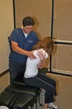 chiropractor giving adjustment