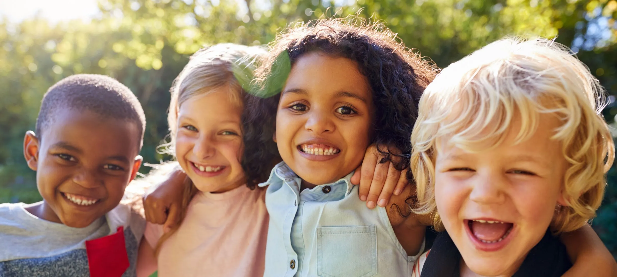 Diverse group of children smiling