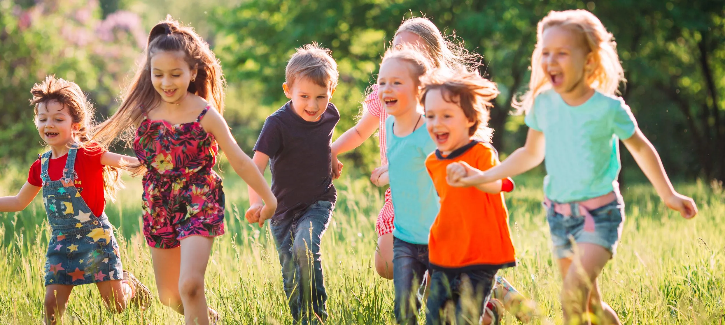 Kids running in field