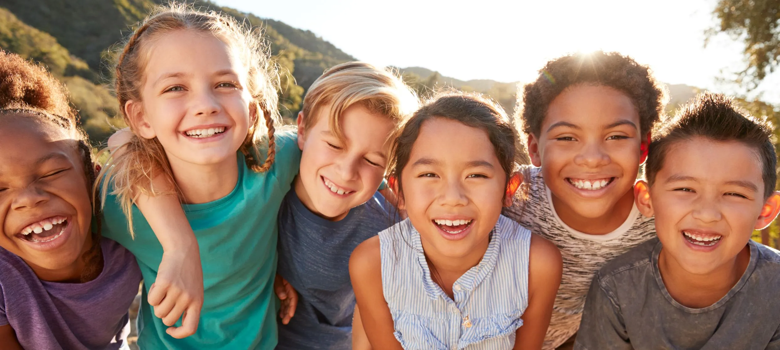 Diverse group of children smiling