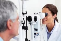 Optometrist testing patients vision 
