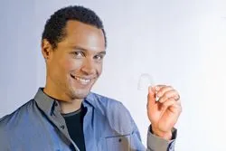 photo of man with invisalign appliance photo of man with invisalign appliance