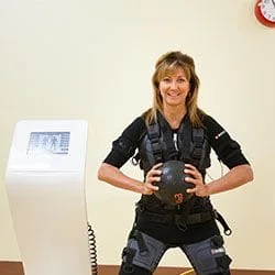 Woman in XBody machine at Nanaimo Health Club