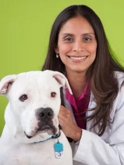 Dr rosales with a white dog