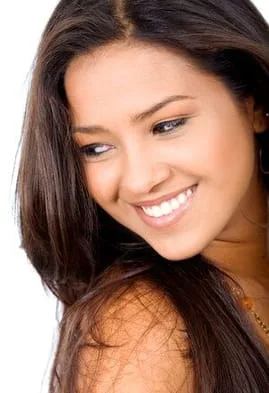 beautiful dark haired woman smiling looking to the side, cosmetic dentistry Selmer, TN 