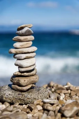 stacked rocks on a beach