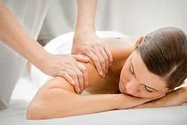 Woman receiving a therapeutic massage