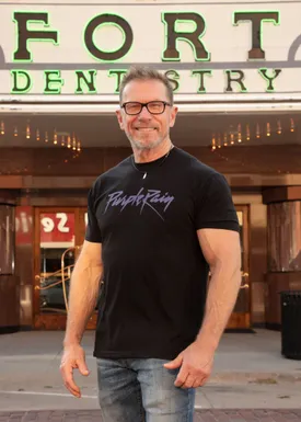 general dentist Dr. Walter D. Martin, DMD standing outside of Fort Theatre Dentistry in Kearney, NE