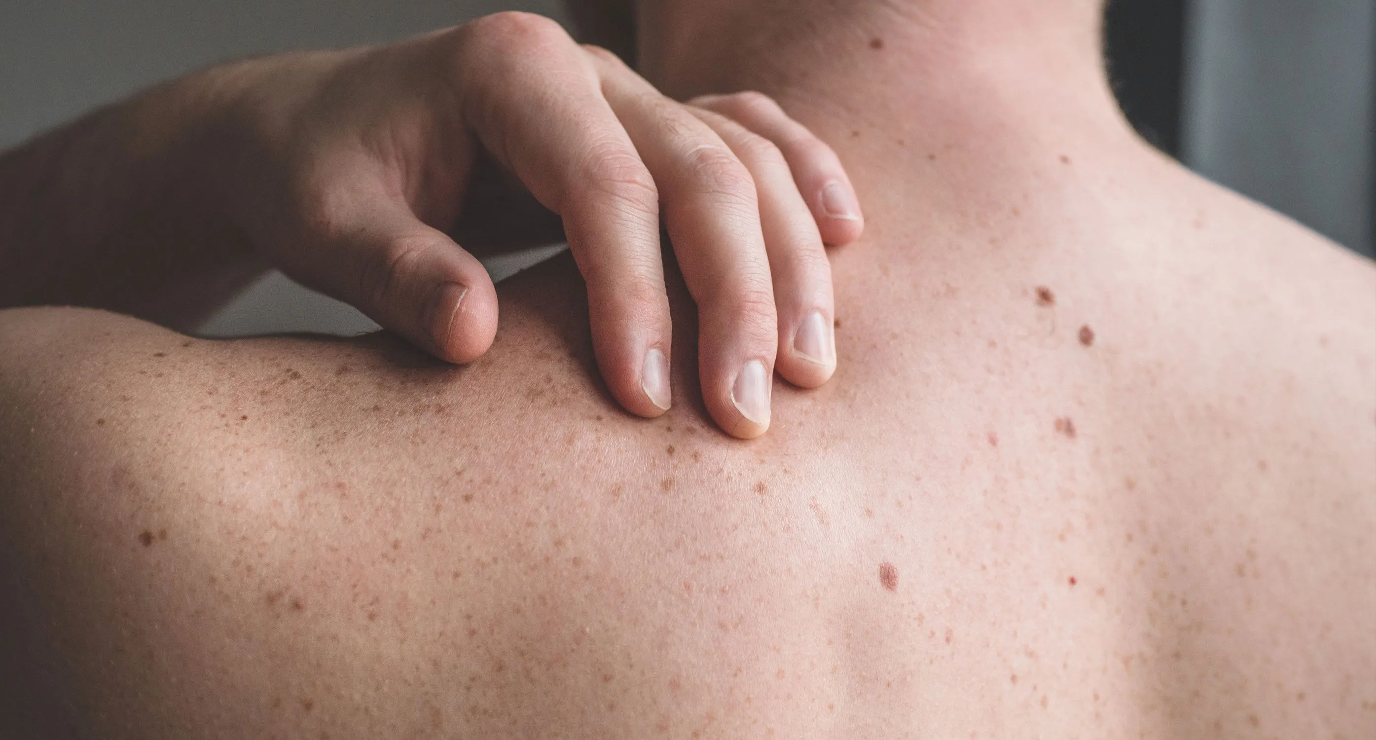 man face with a magnifying glass