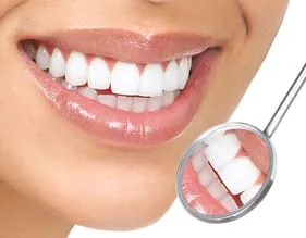 dental mirror reflecting really white teeth, cosmetic dentistry Dearborn, MI