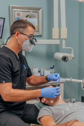 Dentist Dalton - Dr. Robison with dental patient