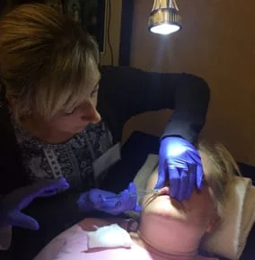 Dentist giving botox facial injectable in Wilmington, DE