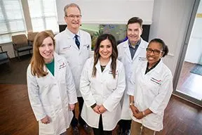 Physicians posing facing camera