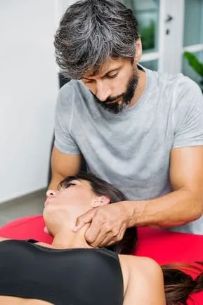 chiropractor treating patient with headache treatment in Kenosha