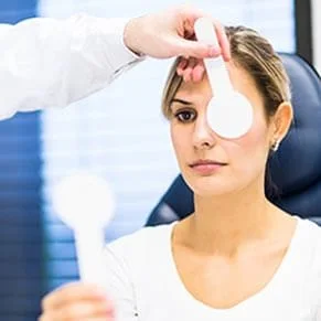 woman having eye checked