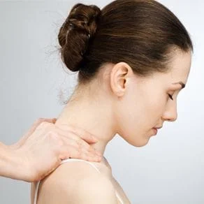 Closeup shot of a woman receiving a neck treatment
