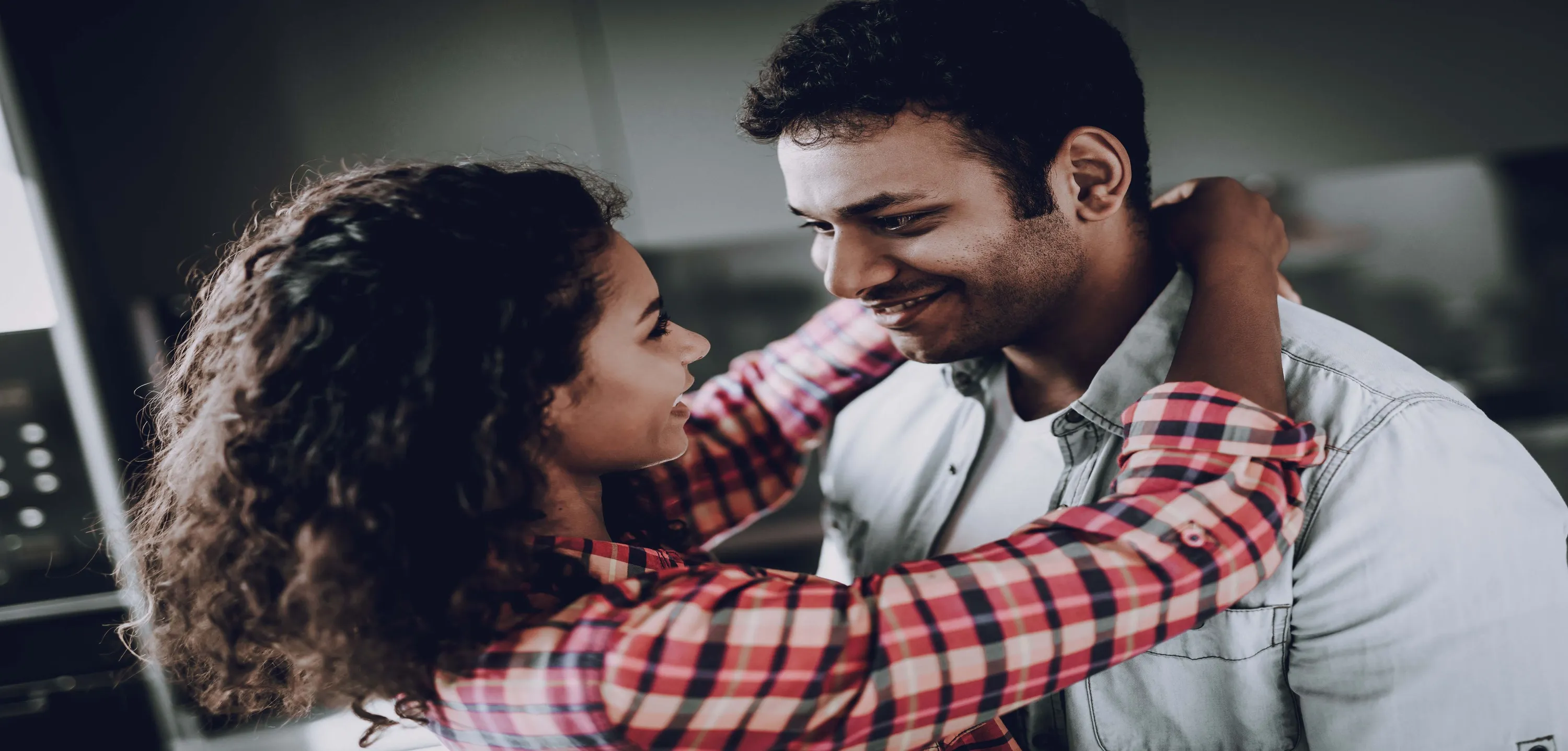 Woman compassionately consoling another woman