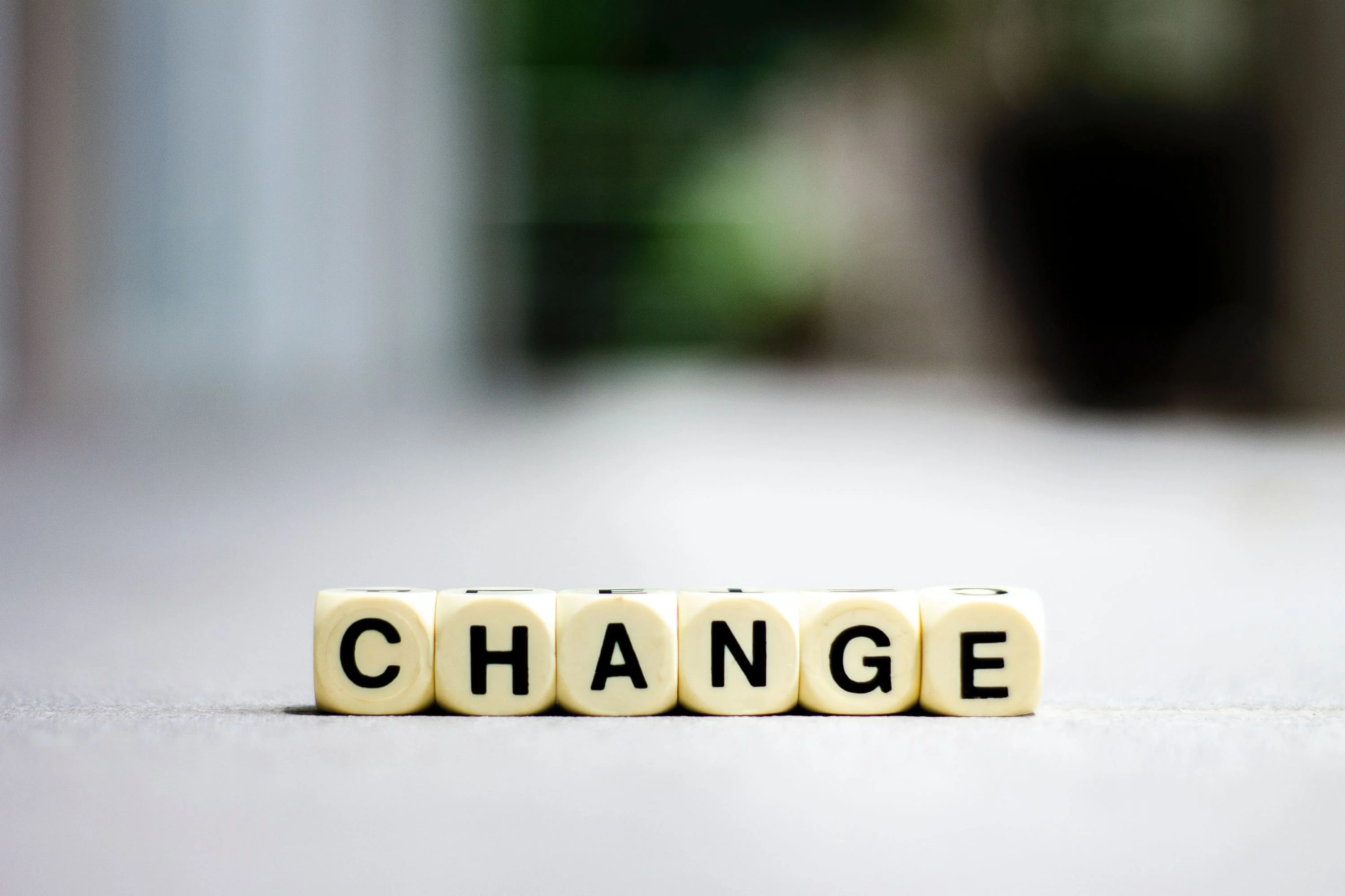 Letter blocks spelling out "change"