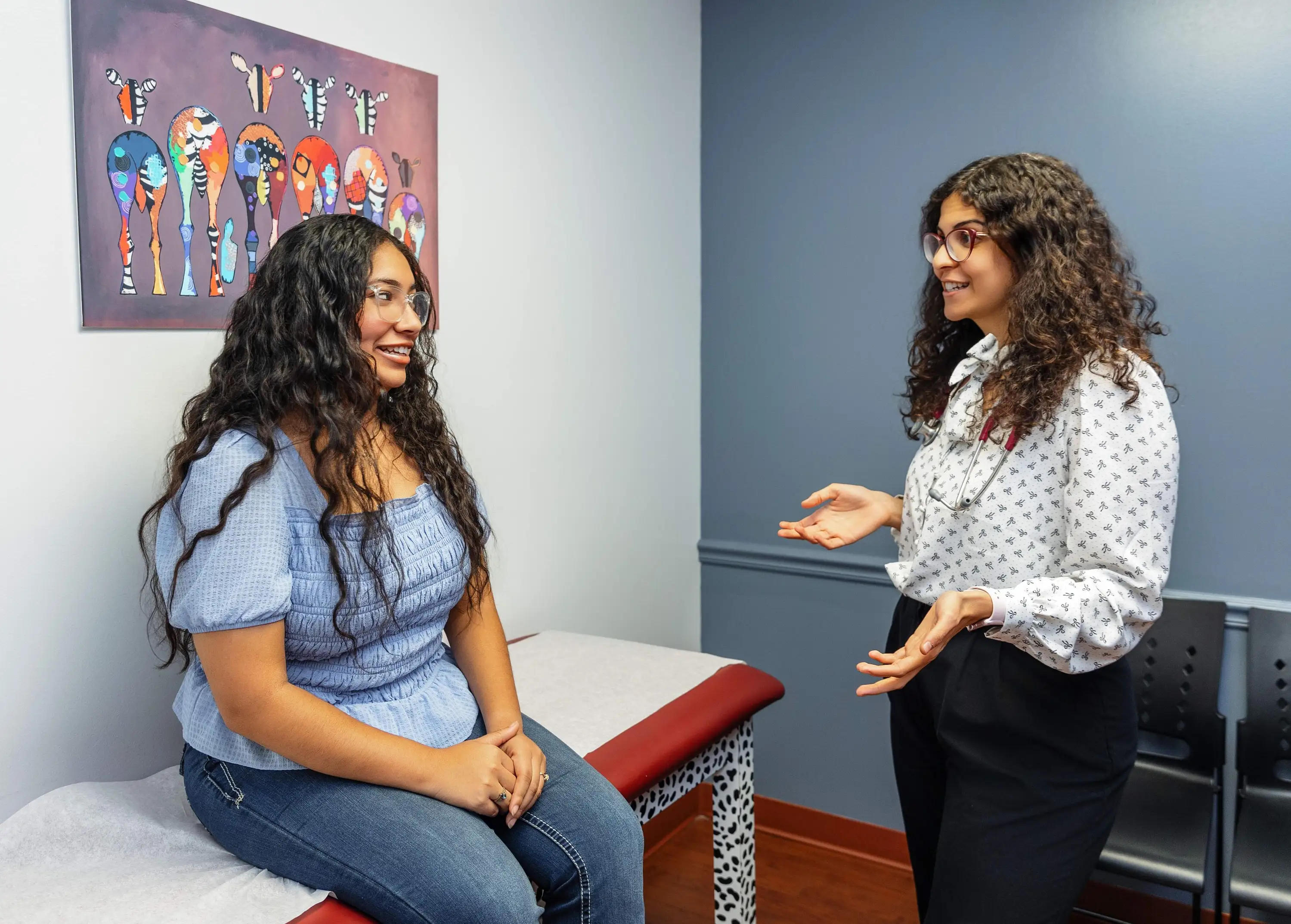 Military Man with the name "Adams" holding infant